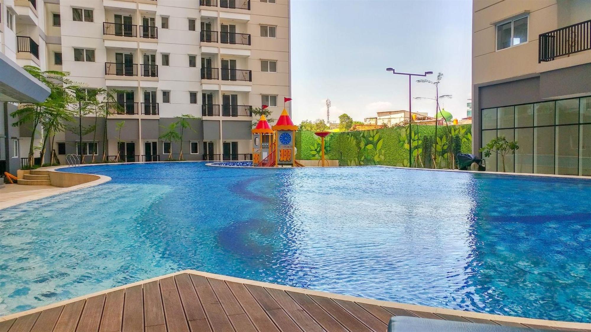 Cozy Signature Park Grande By Travelio Apartment *